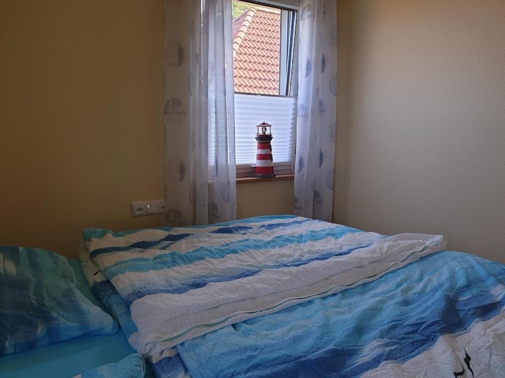 Ferienwohnung Leuchtturm Am Sandstrand Norden Esterno foto